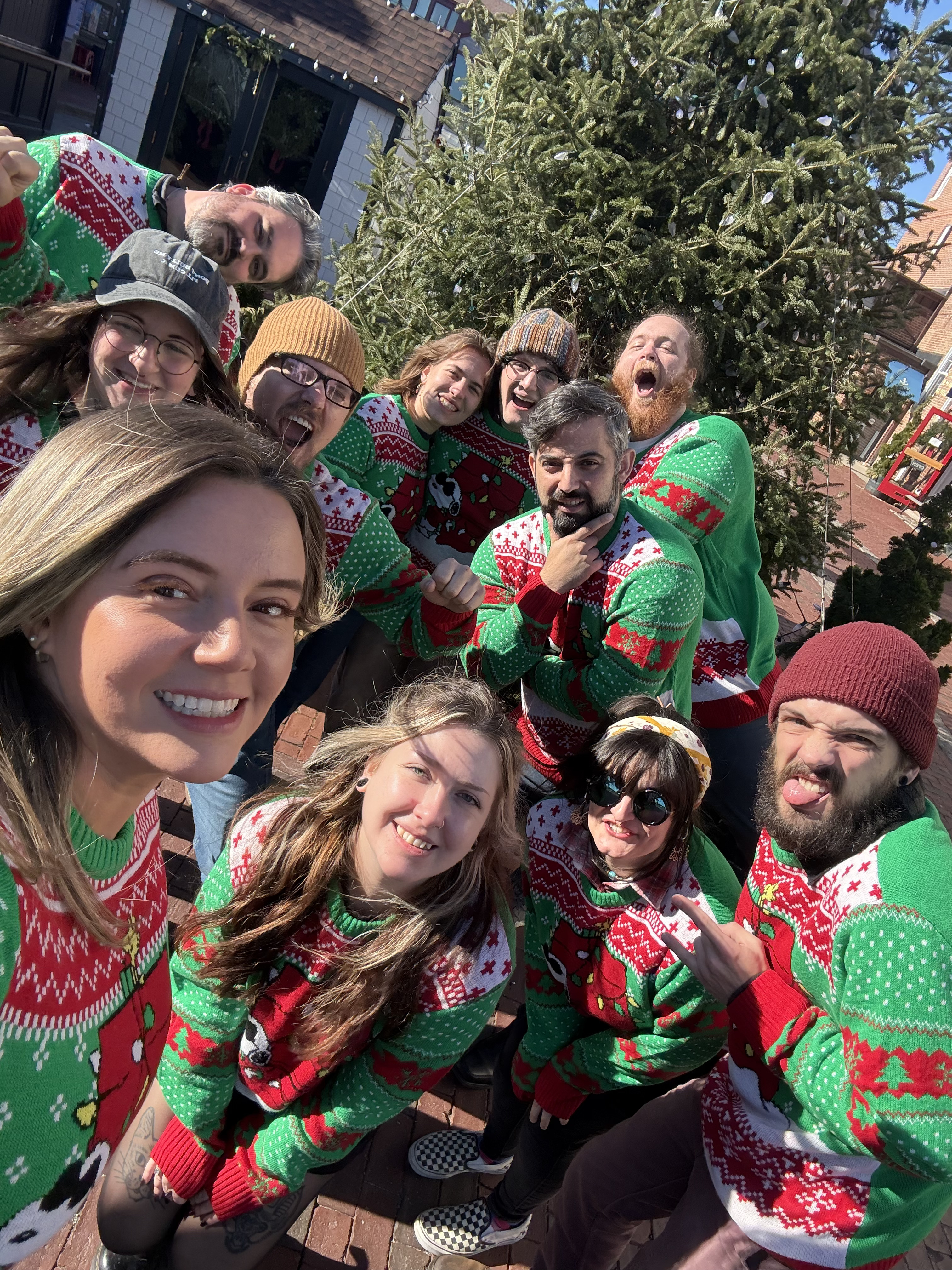 BusySeed team in holiday sweaters
